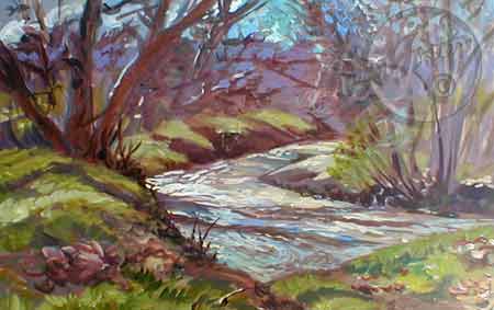 Atascadero Creek as it winds through the hills and trees.