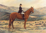 A red horse with a woman riding on the horse in english style with the mountains in the background.