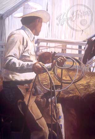 Sam Willis is in a corral getting his rope ready to rope a cow. He is on horseback and the white barn is in the background.