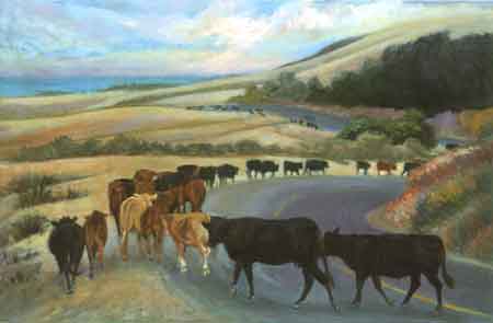 A mixture of colorful cattle are heading down the hilly late summer road to home.A mixture of colorful cattle are heading down the hilly late summer road to home.