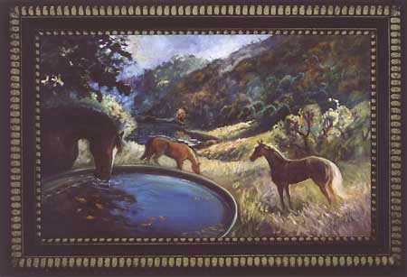 The water trough with it's blue reflected sky color and the golden leaves as they turn on the trees and the three horses grazing and enjoying the day.